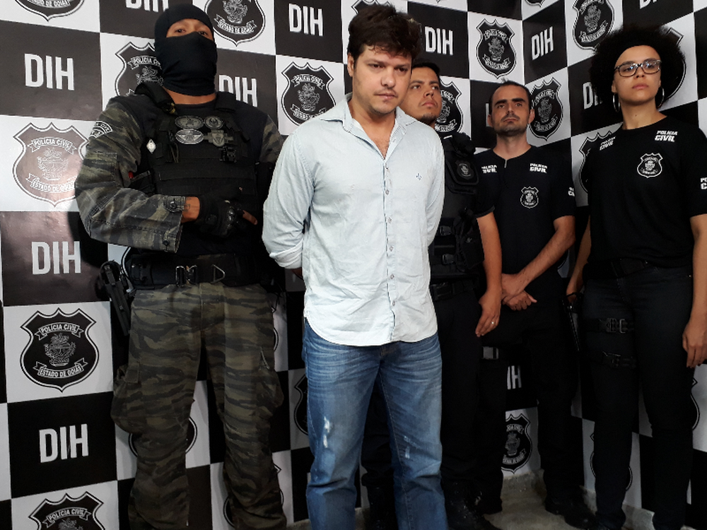 José Carlos Oliveira durante apresentação na DIH. Ele confessou que matou a namorada Giselle Evangelista (Foto: Vitor Santana/Reprodução/G1)