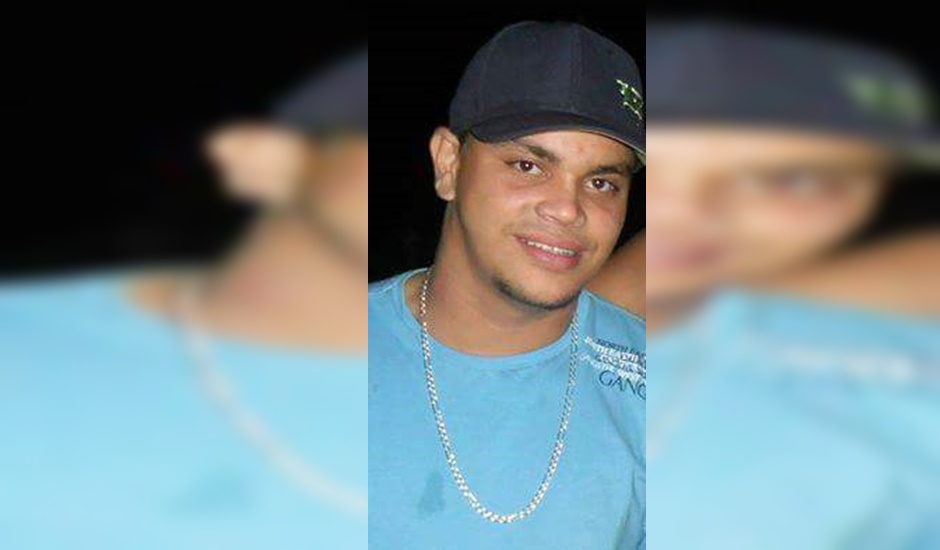 Henrique Resende de Oliveira, que tinha 23 anos, morto com dois tiros pelas costas em Goiânia: Suspeito preso (Foto: Reprodução | Arquivo Pessoal)