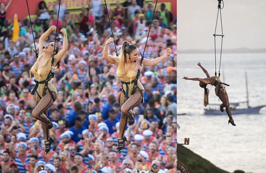 Usando um maiô dourado e meia-calça de bolinha preta, a cantora apareceu "voando" no circuito Barra-Ondina, nesta sexta-feira (21). (Foto: Divulgação)