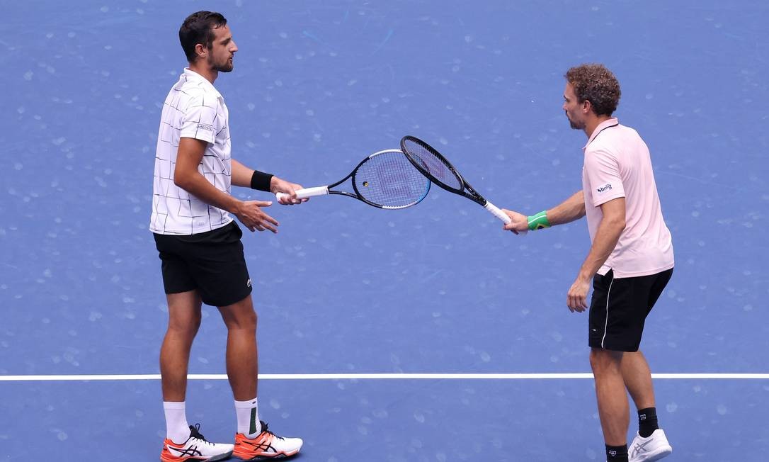 Croata Mate Pavic e brasileiro Bruno Soares conquistam o bicampeonato de duplas masculinas do US Open Foto: AL BELLO / AFP