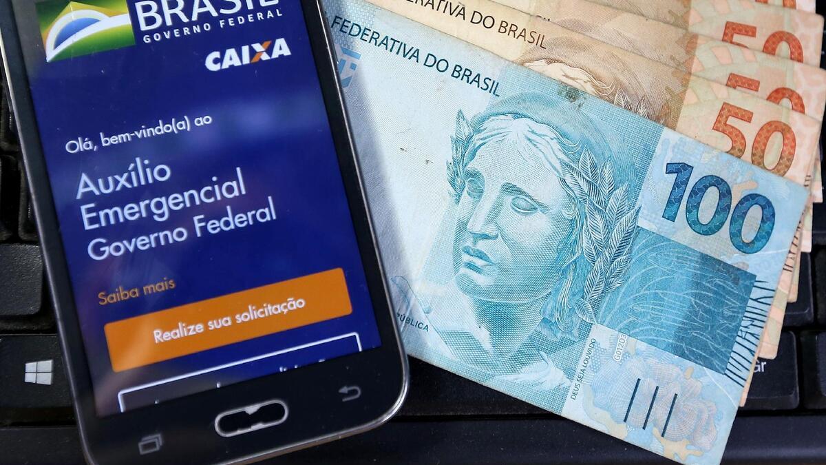 Caixa paga o auxílio para nascidos em fevereiro nesta sexta