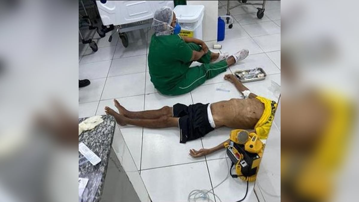 'Chorei, mas tive que levantar', diz enfermeira de foto com paciente morto