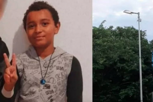 Davi Cristian Silva Santos, 10 anos, morreu após encostar em um poste energizado (dir.), na tarde deste domingo (25), dentro de uma escola estadual de São Vicente (65 km de SP). - Reprodução/ TV Globo