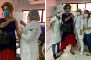 Vestido de Dona Hermínia, maquiador homenageia Paulo Gustavo ao tomar vacina