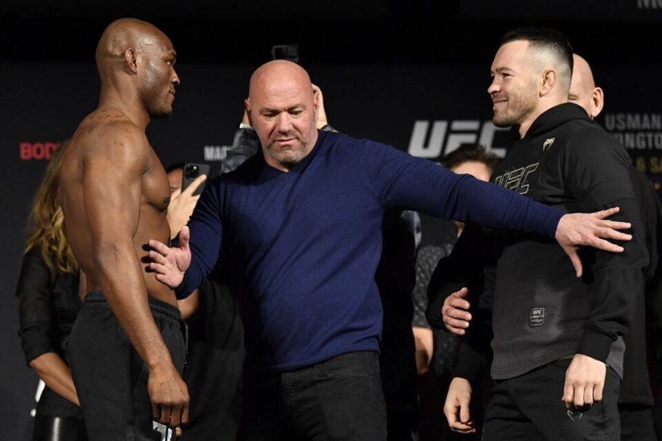 Kamaru Usman (esquerda) e Colby Covington (direita) durante encarada