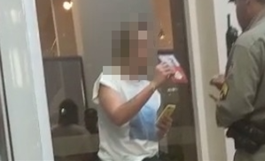 Delegada foi conduzida à delegacia e autuada por ameaça após sacar arma contra entregador de comida (Foto: reprodução/Vídeo)