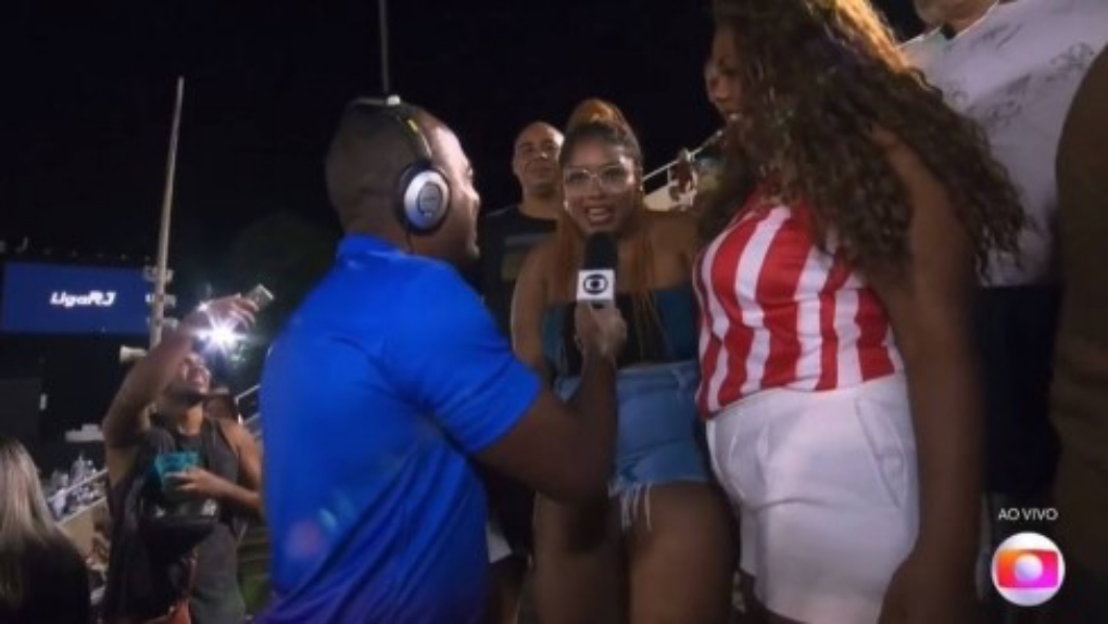 Foliã viraliza e vira meme após dizer que veio da Costa do Marfim em entrevista ao vivo na Sapucaí: Zona Norte está diferente