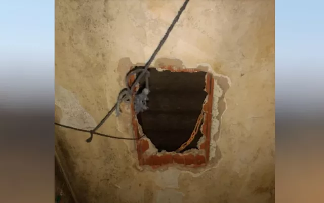 Buraco feito no teto de presídio por detentos que tentaram fugir