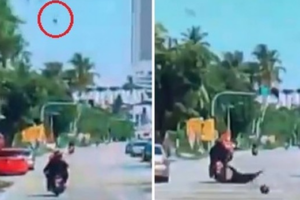 Mulher cai da garupa de moto após ser atingida na cabeça por coco