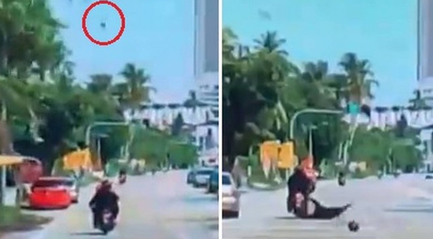 Mulher cai da garupa de moto após ser atingida na cabeça por coco