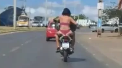 Mulher passeia de lingerie em garupa de moto na Cidade Ocidental
