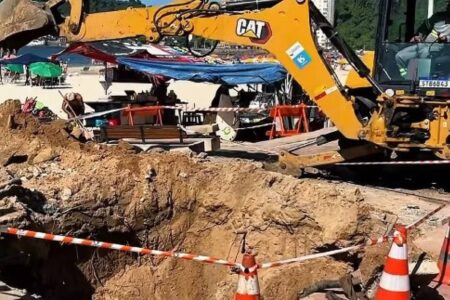 Três ficam feridos após cratera surgir na orla de São Vicente (SP)