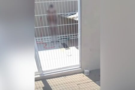 Homem nu preso em canil de Pouso Alegre (Foto: Reprodução)