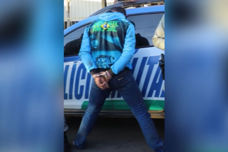 Homem preso por homicídio (Foto: Reprodução)