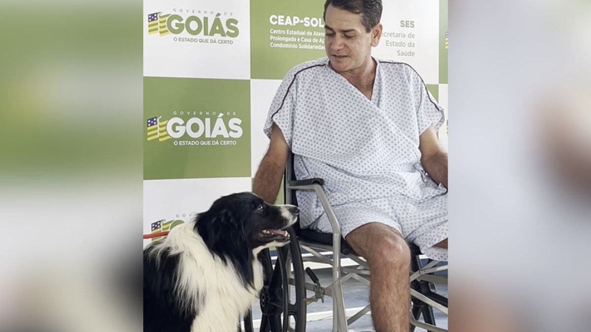 Elcilei Alves, de 46 anos, no reencontro com cachorro dele (Foto: Reprodução)