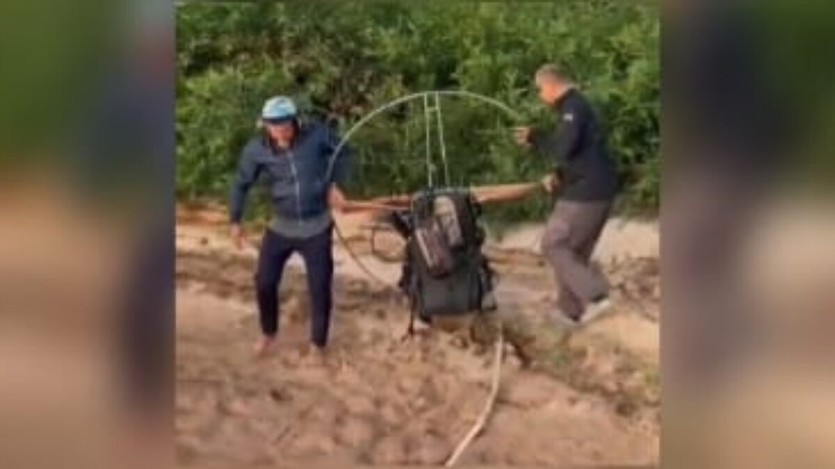 Imagem do motor sendo retirado da área de mata