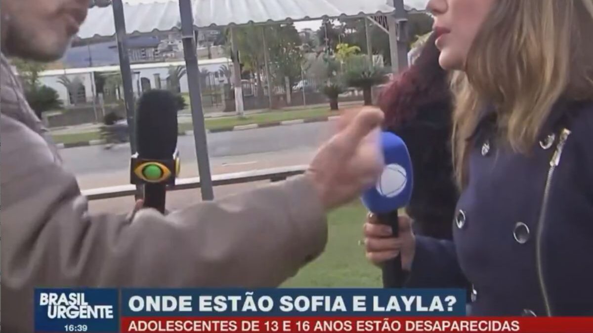 Repórteres da Band e da Record discutem no ar (Foto: Reprodução)
