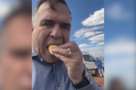 Prefeito Mabel tomando lanche no lixão de Goiânia (Foto: Reprodução)