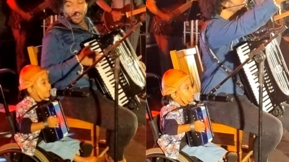 Criança em cadeira de rodas canta ao lado de Mestrinho em show em Goiânia