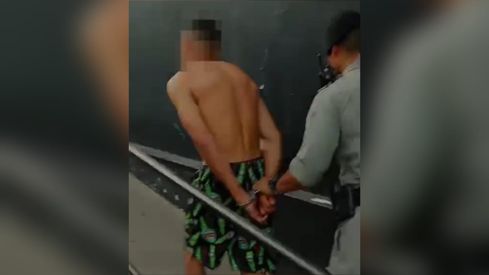 Imagem do homem sendo preso