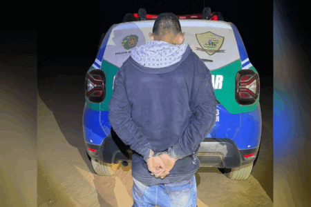 Homem preso por homicídio (Foto: Reprodução)