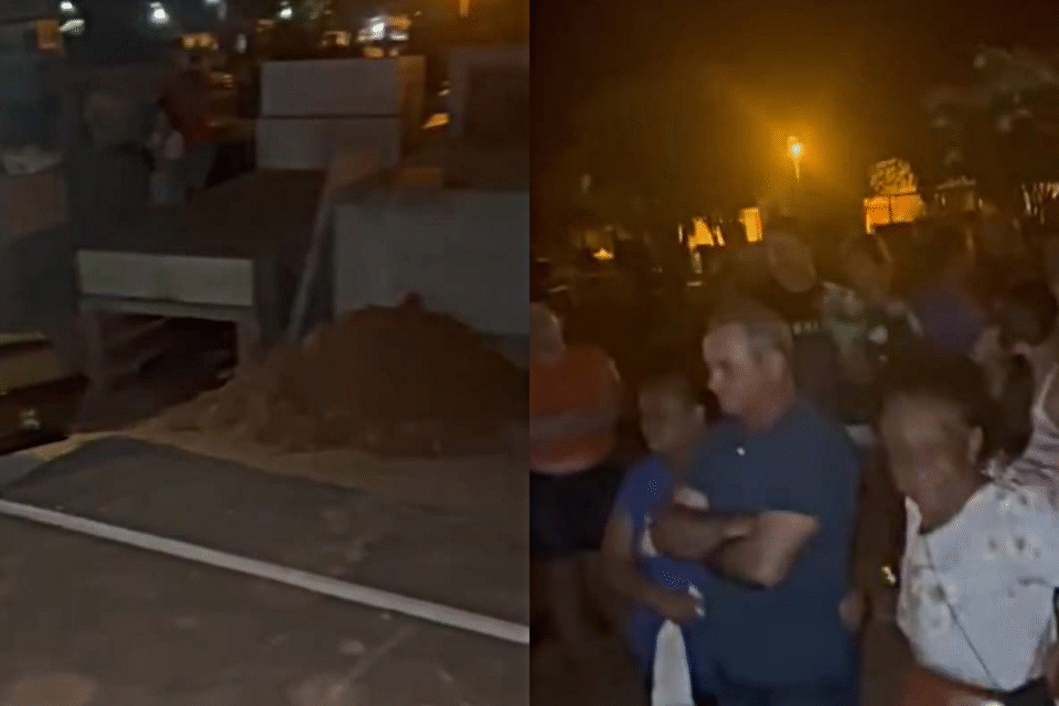 Imagem do jazigo aberto e as pessoas aguardando