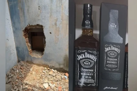 Imagem mostra buraco feito na parede que permitiu acesso dos criminosos ao interior do estabelecimento