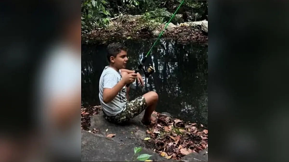 Foto da criança pescando