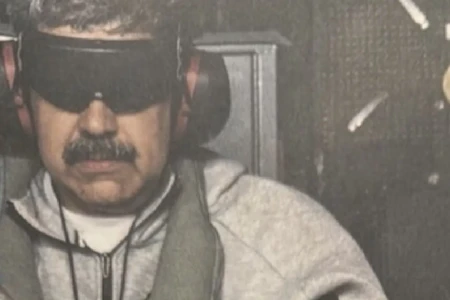 Trump-Posts-Photo-of-Captured-Maduro-Aboard-USS-Iwo-Jima