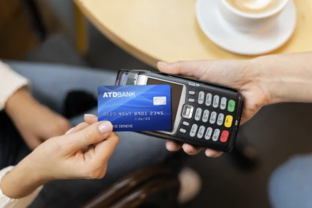 person-paying-with-its-credit-card