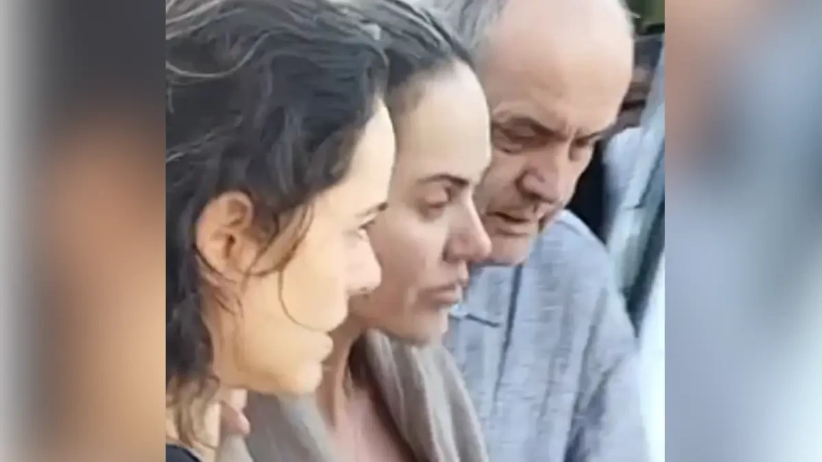 Vídeo: mãe de criança morta pelo pai em Itumbiara deixa velório do filho mais velho abraçada com o pai dela (Foto: Mais Goiás)