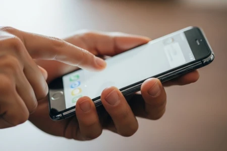 person-using-smartphone-touchscreen