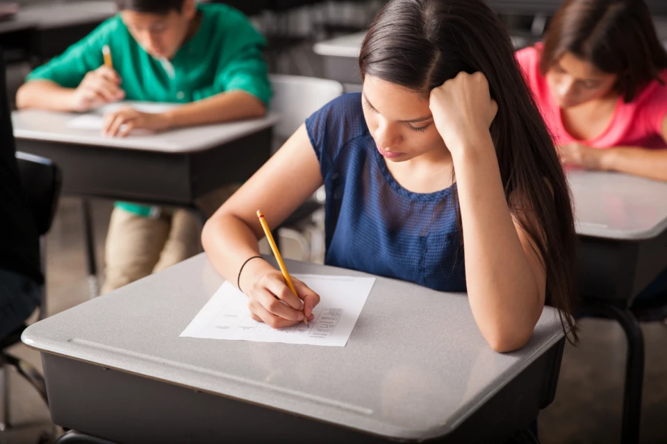 group-high-school-students-taking-test-classroom